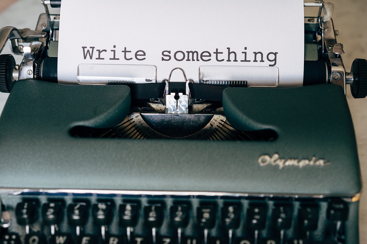 Writer drafting a blog post at a desk
