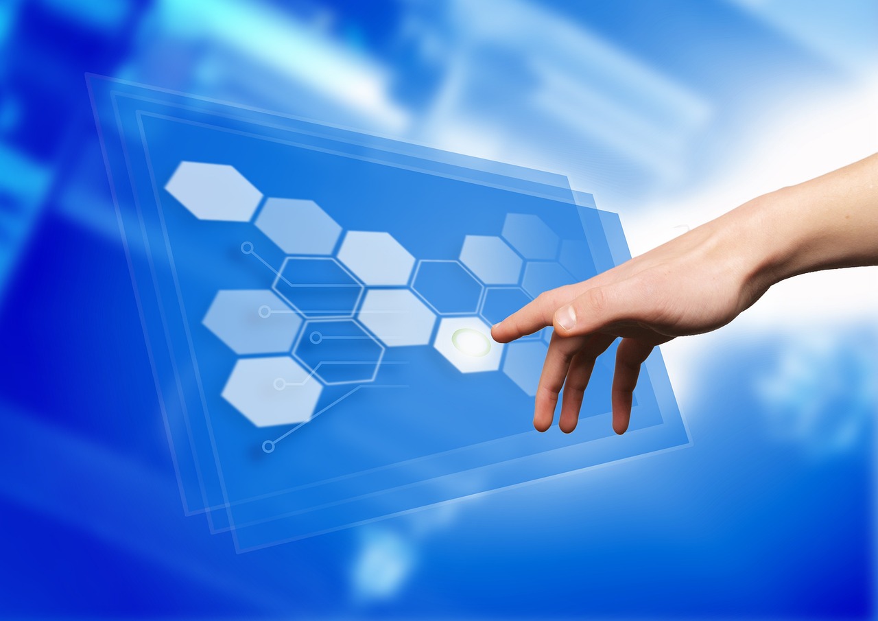 Hand clicking publish button on a blog dashboard
