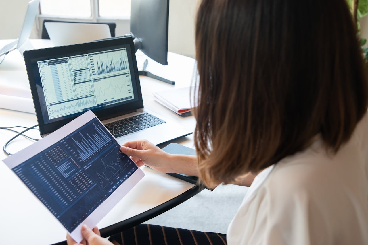 Marketer analysing data on computer screen
